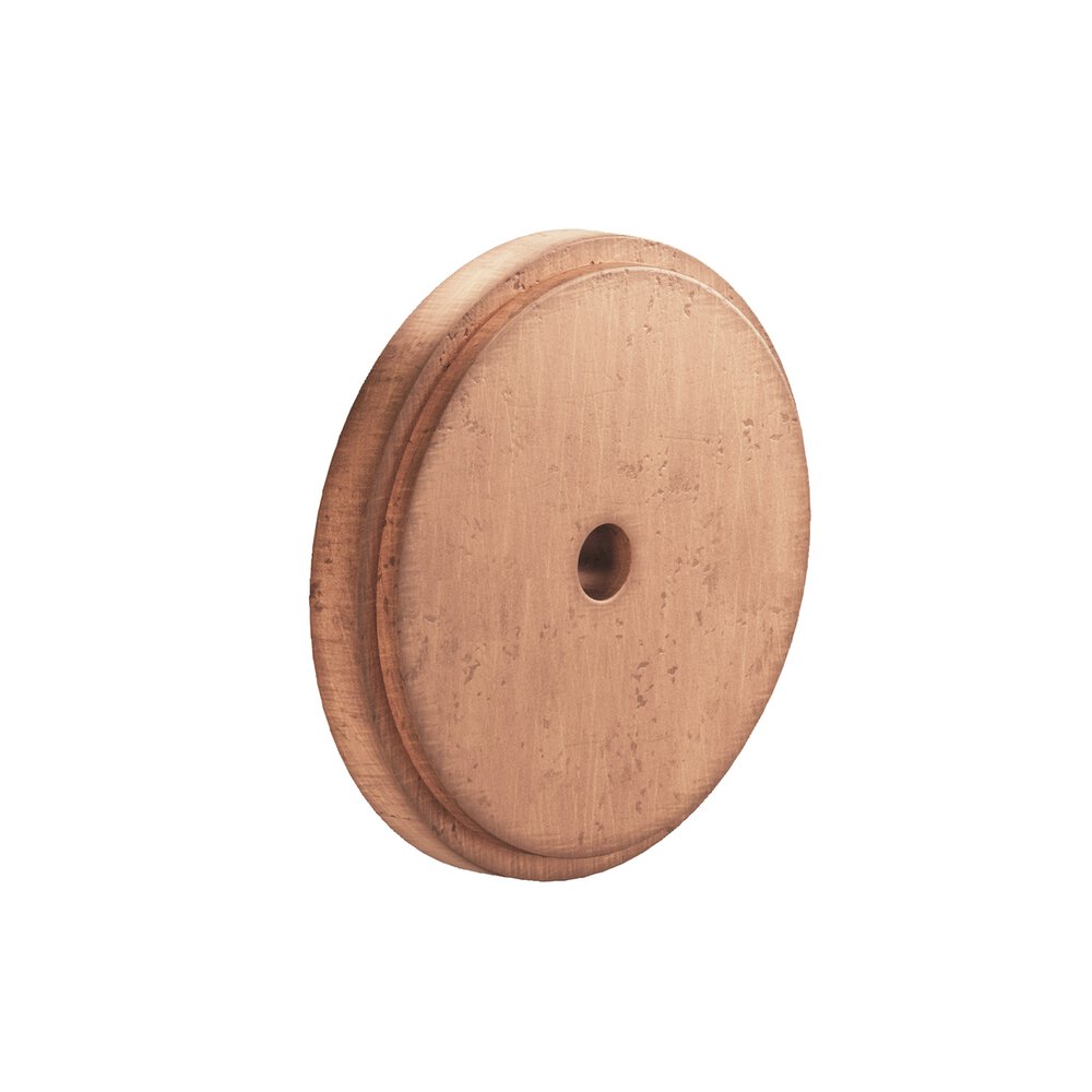 1.25" Diameter Round Stepped Backplate In Distressed Antique Copper