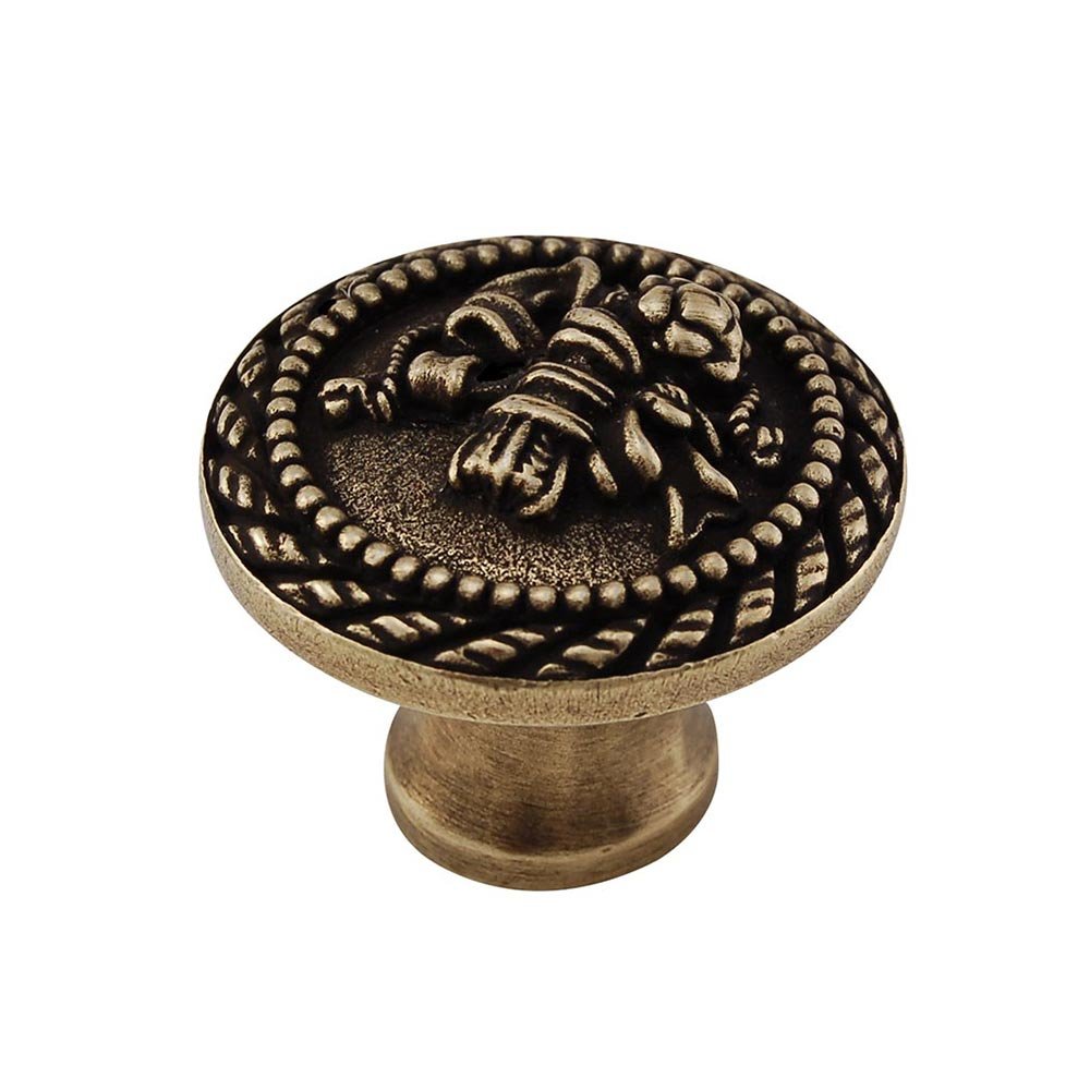 1 1/4" Classical Knob with Small Base in Antique Brass