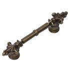 3" Center Pull with Small Fleur De Lys Ends in Antique Brass